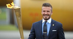 David Beckham with the Olympic Flame