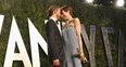 Anne Hathaway and Adam Shulman hug at the Oscars 2